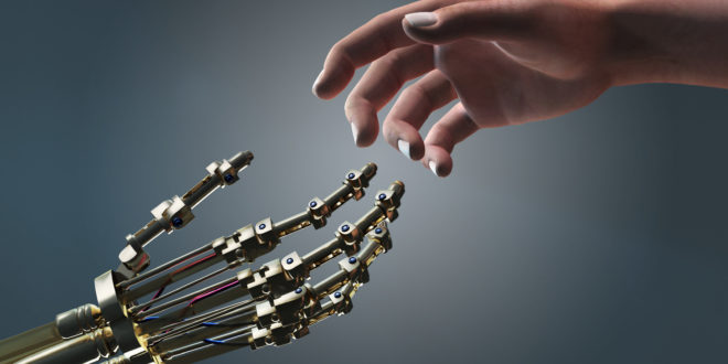 a hand reaching for a robot hand