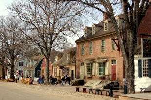 a group of people walking on a street