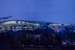 a large building with lights at night