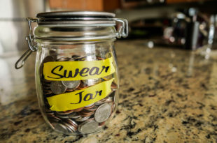 a jar of coins on a counter