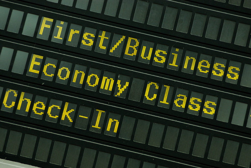 first business economy coach check in