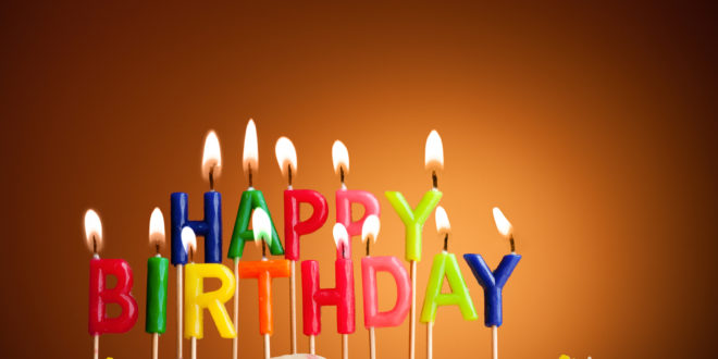 a birthday cake with candles