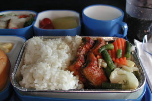 a tray of food with different containers