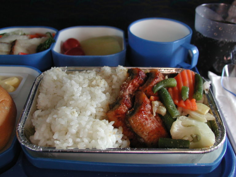 a tray of food with different containers