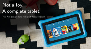 a tablet with a blue case and a black and white pattern