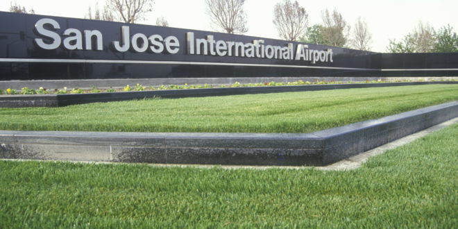 a sign with a sign in front of a large sign