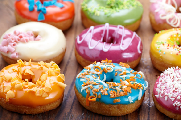 a group of donuts with frosting