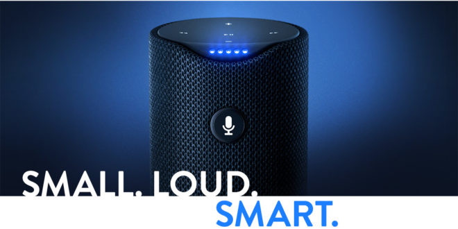 a black speaker with a round button and blue lights
