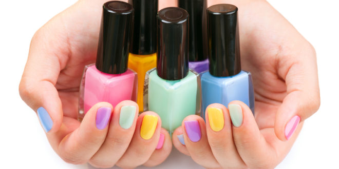 a group of colorful nail polish bottles