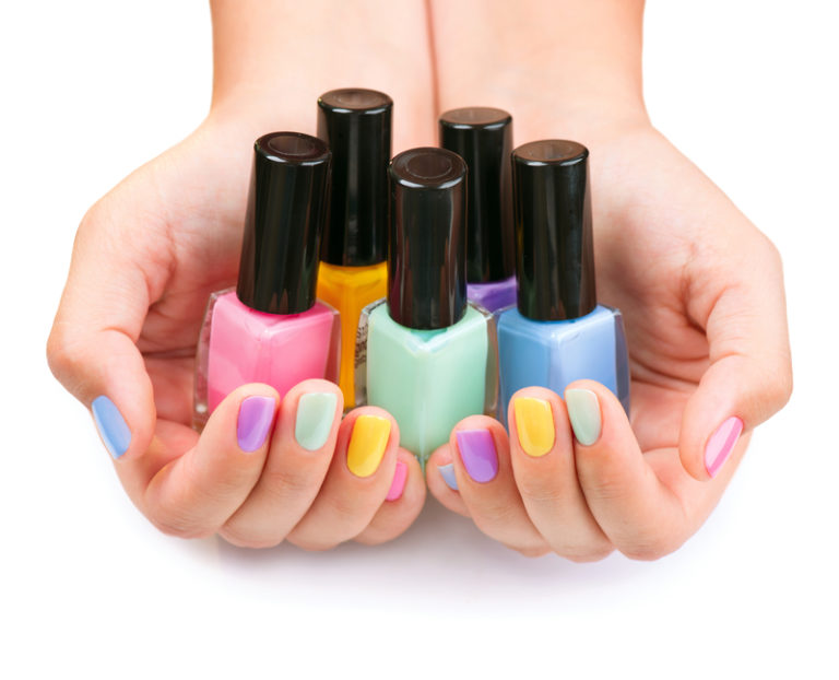 a group of colorful nail polish bottles