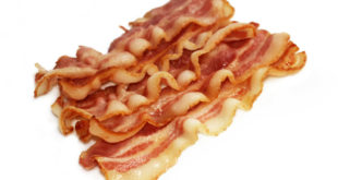 a pile of bacon on a white background