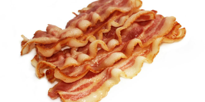 a pile of bacon on a white background