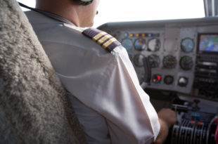 a pilot in a cockpit