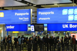 a group of people in an airport