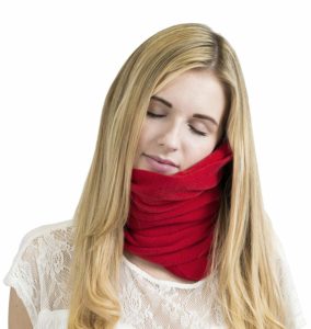 a woman with a red scarf around her neck