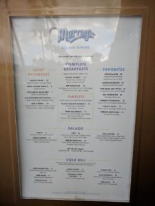 a menu board with text on it